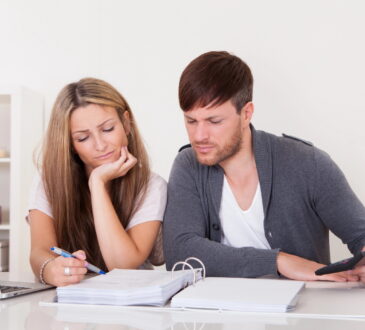 Newlywed couple having calm money talks and building financial teamwork